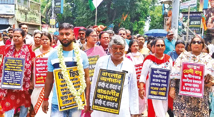 পরিযায়ী শ্রমিক দেবাশিসকে নিয়ে মিছিল, কটাক্ষ বিজেপির