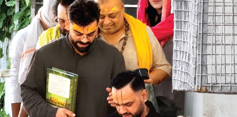 আইপিএল জেতার পর বৃন্দাবনে সস্ত্রীক কোহলি