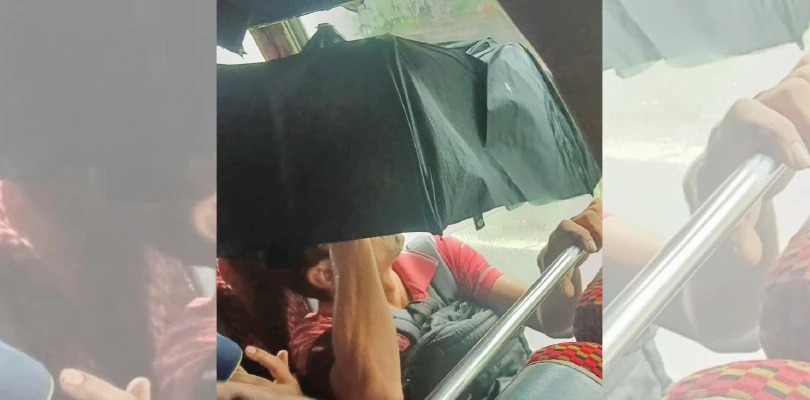 ছাদ থেকে চুঁইয়ে পড়ছে বৃষ্টির জল, বাসেই মাথায় ছাতা নিয়ে বসে যাত্রীরা!