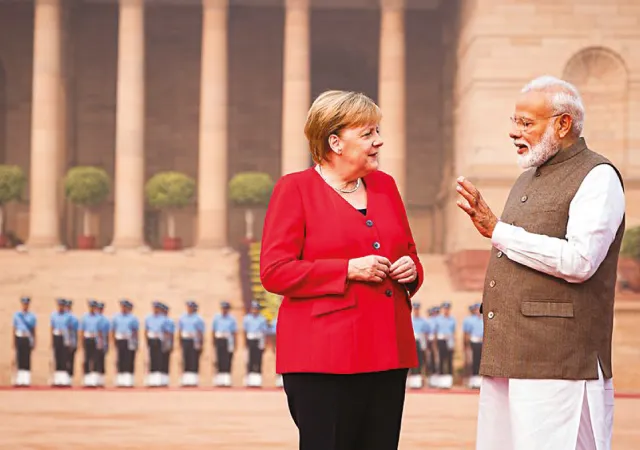 প্রচারসর্বস্ব মোদি, দূরদর্শী মনমোহন,&nbsp;প্রাক্তন জার্মান চ্যান্সেলার