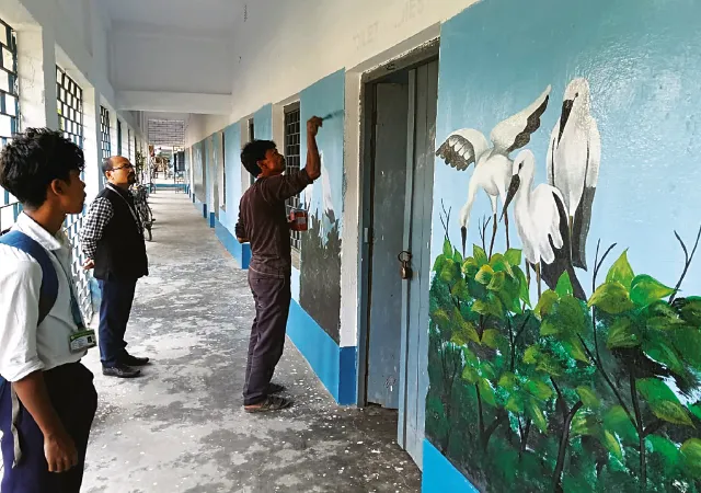 কুলিক পক্ষীনিবাসের ছবি ফুটছে কর্ণজোড়া হাইস্কুলের দেওয়ালে