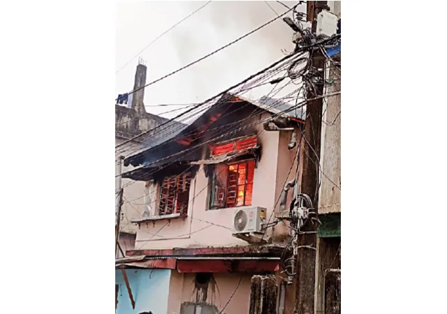 বাইরে থেকে তালাবন্ধ ঘরে আগুন কিশোরকে উদ্ধার পড়শিদের
